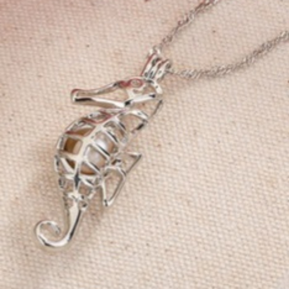 Sterling silver pearl cage seahorse necklace